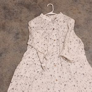 Light weight button up front shirt white with blue flowers.